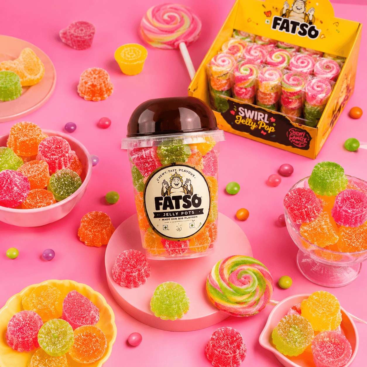 Fatso jellies and jelly pops on a bright pink party set