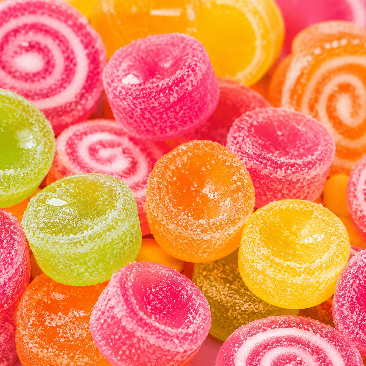 Colourful Fatso lollipop swirls and smiley pops